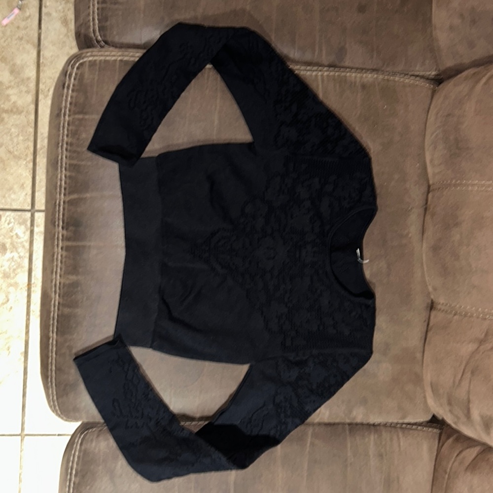 Long sleeve black designed top